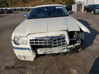 2006 Chrysler 300 C with VIN 2C3KA63H86H388808, listed as a Copart auction lot 50442015 with 129,848 mi miles and Salvage Title. Bid and sale history available at carsss.com. Image 5.