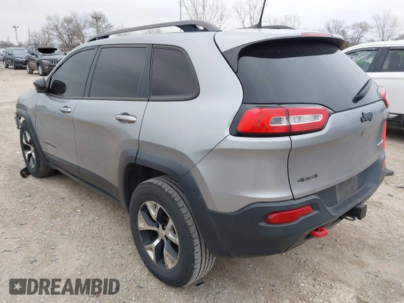 2016 Jeep Cherokee Trailhawk with VIN 1C4PJMBS7GW192574, listed as a IAAI auction lot 41986638 with 144,970 mi miles and . Bid and sale history available at DreamBid. Image 3.