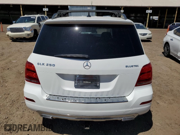 2015 Mercedes-Benz GLK 250 with VIN WDCGG0EB2FG402004, listed as a Copart auction lot 63126493 with 130,821 mi miles and . Bid and sale history available at DreamBid. Image 6.