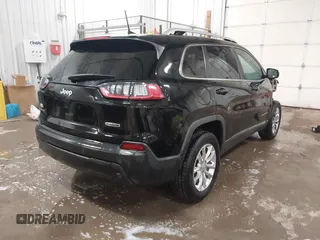 2021 Jeep Cherokee Altitude with VIN 1C4PJMLBXMD160546, listed as a IAAI auction lot 41526730 with 70,044 mi miles. Bid and sale history available at carsss.com. Image 4.