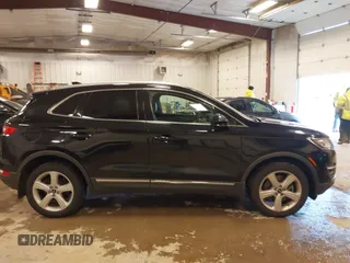 2017 Lincoln MKC Premiere with VIN 5LMCJ1D97HUL35066, listed as a IAAI auction lot 41224223 with 124,826 mi miles. Bid and sale history available at carsss.com. Image 13.