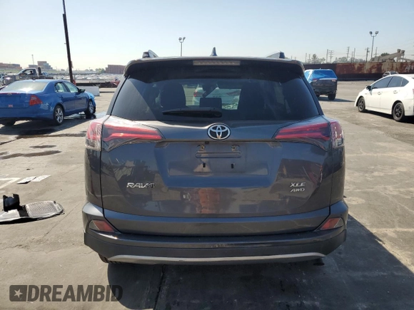 2018 Toyota RAV4 XLE with VIN JTMRFREVXJD251679, listed as a Copart auction lot 49454115 with 48,385 mi miles and Salvage Title. Bid and sale history available at DreamBid. Image 6.