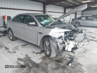 2014 Ford Taurus Limited с VIN 1FAHP2F89EG186147, выставлен на аукционе IAAI как лот 42228000 с пробегом 179 863 миль миль и . История ставок и продаж доступна на DreamBid. Изображение 1.