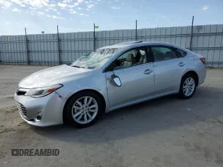 2013 Toyota Avalon XLE with VIN 4T1BK1EBXDU013075, listed as a Copart auction lot 63141855 with 66,779 mi miles and Salvage title. Bid and sale history available at DreamBid. Image 1.