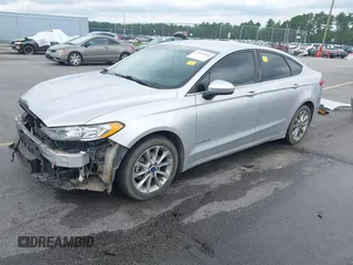 2017 Ford Fusion Hybrid SE with VIN 3FA6P0LU2HR317784, listed as a IAAI auction lot 42618554 with 114,814 mi miles and . Bid and sale history available at DreamBid. Image 19.