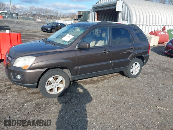 2009 Kia Sportage LX with VIN KNDJE723097623239, listed as a IAAI auction lot 41233933 with 169,444 mi miles. Bid and sale history available at carsss.com. Image 2.