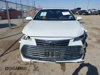 2019 Toyota Avalon XLE with VIN 4T1BZ1FB8KU030044, listed as a IAAI auction lot 41436242 with 56,261 mi miles and . Bid and sale history available at carsss.com. Image 6.