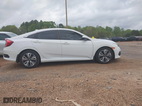 2017 Honda Civic EX-L with VIN 2HGFC1F72HH658763, listed as a IAAI auction lot 41972317 with 166,168 mi miles and . Bid and sale history available at DreamBid. Image 14.