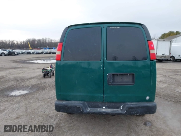 2014 Chevrolet Express Cargo Van with VIN 1GCWGGCAXE1198199, listed as a IAAI auction lot 41242821 with 274,446 mi miles. Bid and sale history available at carsss.com. Image 16.