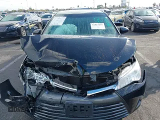 2015 Toyota Camry XLE z VIN 4T4BF1FK3FR507807, wystawiony jako IAAI lot #41423295 z przebiegiem 100 080 mil mil oraz . Historia ofert i sprzedaży dostępna na DreamBid. Obrazek 13.