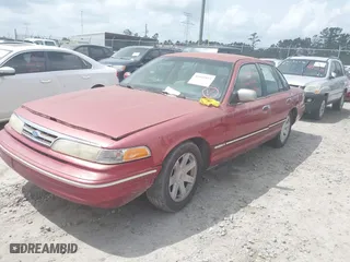 1996 Ford Crown Victoria with VIN 2FALP73W9TX127763, listed as a IAAI auction lot 41935853 with 1 mi miles. Bid and sale history available at carsss.com. Image 2.