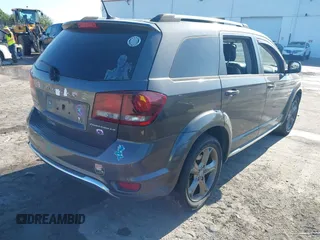 2016 Dodge Journey Crossroad Plus z VIN 3C4PDCGB0GT209506, wystawiony jako IAAI lot #42044055 z przebiegiem 93 115 mil mil oraz . Historia ofert i sprzedaży dostępna na DreamBid. Obrazek 4.