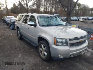 2007 Chevrolet Suburban LTZ with VIN 3GNFK16397G292093, listed as a IAAI auction lot 41884909 with 160,842 mi miles. Bid and sale history available at carsss.com. Image 1.