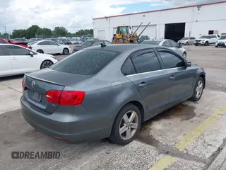 2013 Volkswagen Jetta TDI w/Premium with VIN 3VWLL7AJ4DM351806, listed as a IAAI auction lot 42654515 with 146,910 mi miles and . Bid and sale history available at DreamBid. Image 4.