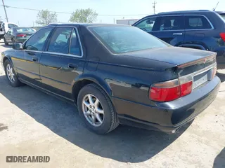 1998 Cadillac Seville Touring STS with VIN 1G6KY5499WU916185, listed as a IAAI auction lot 42035783 with 164,763 mi miles. Bid and sale history available at carsss.com. Image 3.