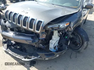 2014 Jeep Cherokee Limited with VIN 1C4PJLDS4EW283855, listed as a IAAI auction lot 41840848 with 143,686 mi miles. Bid and sale history available at carsss.com. Image 6.