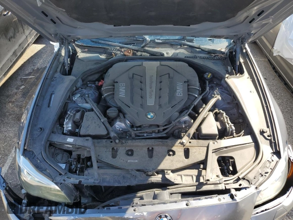 2014 BMW 5 Series 550i z VIN WBAKN9C58ED681754, wystawiony jako Copart lot #47830765 z przebiegiem 73 763 mil mil oraz Szkoda całkowita • Salvage title. Historia ofert i sprzedaży dostępna na DreamBid. Obrazek 11.