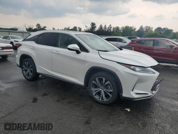 2020 Lexus RX 350 with VIN 2T2HZMDA1LC228727, listed as a Copart auction lot 60271385 with 37,776 mi miles and Salvage title. Bid and sale history available at DreamBid. Image 4.