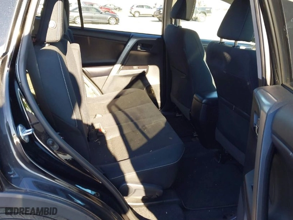 2018 Toyota RAV4 XLE with VIN 2T3RFREV9JW793956, listed as a IAAI auction lot 41012152 with 77,033 mi miles. Bid and sale history available at carsss.com. Image 8.
