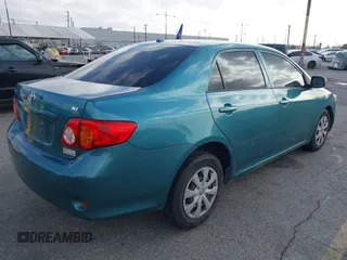 2010 Toyota Corolla with VIN JTDBU4EE4A9104965, listed as a IAAI auction lot 41956372 with 206,535 mi miles. Bid and sale history available at carsss.com. Image 4.