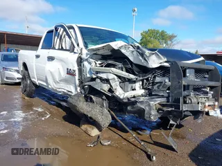 2014 Ram 2500 Tradesman z VIN 3C6TR5CT1EG234972, wystawiony jako IAAI lot #40605313 z przebiegiem 170 001 mil mil oraz . Historia ofert i sprzedaży dostępna na DreamBid. Obrazek 6.