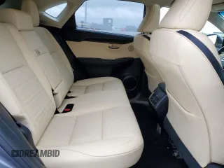 2015 Lexus NX 200t z VIN JTJBARBZ0F2001908, wystawiony jako Copart lot #52128205 z przebiegiem 143 333 mil mil oraz Szkoda całkowita • Salvage title. Historia ofert i sprzedaży dostępna na DreamBid. Obrazek 11.
