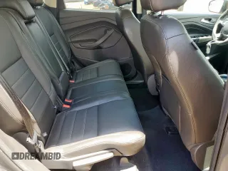 2015 Ford Escape Titanium with VIN 1FMCU0J92FUB80769, listed as a Copart auction lot 61988435 with 103,212 mi miles and Salvage title. Bid and sale history available at DreamBid. Image 11.