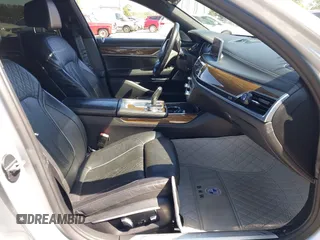 2016 BMW 7 Series 750i xDrive with VIN WBA7F2C52GG417733, listed as a IAAI auction lot 42040625 with 91,007 mi miles. Bid and sale history available at carsss.com. Image 5.