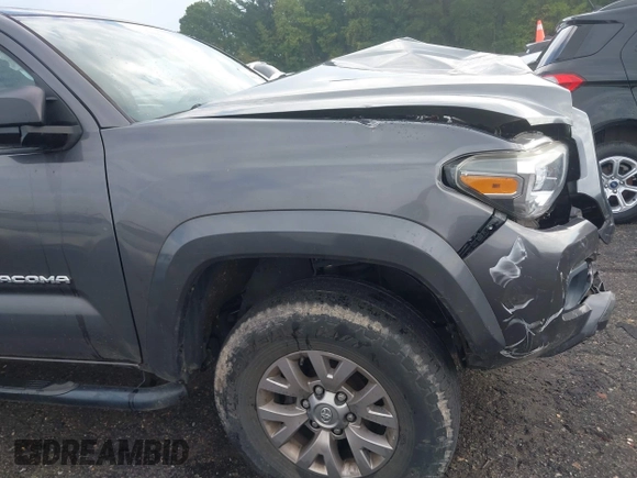 2016 Toyota Tacoma SR with VIN 5TFRX5GN6GX070766, listed as a IAAI auction lot 40461070 with 144,039 mi miles and . Bid and sale history available at DreamBid. Image 18.