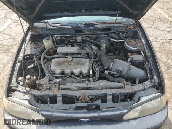 1998 Ford Escort SE z VIN 1FAFP13P9WW174004, wystawiony jako Copart lot #65843664 z przebiegiem 101 507 mil mil oraz Czysty tytuł • Clean title. Historia ofert i sprzedaży dostępna na DreamBid. Obrazek 11.