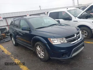 2014 Dodge Journey SXT with VIN 3C4PDCBB4ET245932, listed as a IAAI auction lot 41857444 with 228,827 mi miles. Bid and sale history available at carsss.com. Image 1.