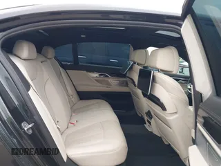 2019 BMW 7 Series 750i with VIN WBA7F0C50KGM26010, listed as a IAAI auction lot 42188421 with 71,576 mi miles and . Bid and sale history available at DreamBid. Image 8.