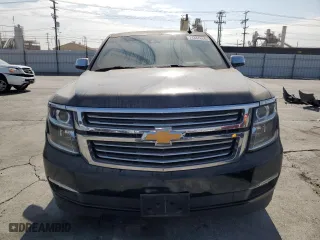 2017 Chevrolet Suburban Premier with VIN 1GNSCJKC0HR140111, listed as a Copart auction lot 74387664 with 104,094 mi miles and Salvage Title. Bid and sale history available at carsss.com. Image 5.