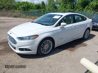 2013 Ford Fusion SE Hybrid with VIN 3FA6P0LU4DR337674, listed as a IAAI auction lot 42164262 with 150,902 mi miles and . Bid and sale history available at carsss.com. Image 2.
