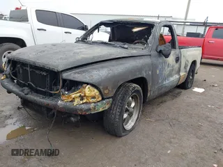 1998 Dodge Dakota SLT with VIN 1B7FL26X6WS656704, listed as a IAAI auction lot 41418285 with Not provided miles and . Bid and sale history available at DreamBid. Image 2.