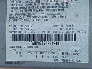 2008 Ford Fusion SE with VIN 3FAHP07198R212491, listed as a IAAI auction lot 39970757 with 258,676 mi miles. Bid and sale history available at carsss.com. Image 9.