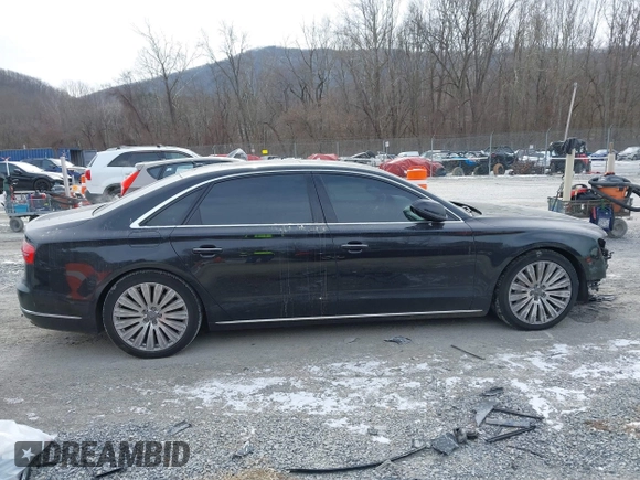 2015 Audi A8 L 4.0T with VIN WAU32AFD7FN006233, listed as a IAAI auction lot 41353034 with 119,693 mi miles. Bid and sale history available at carsss.com. Image 13.