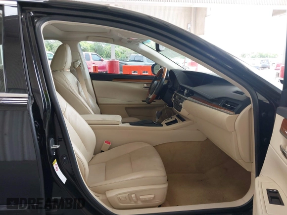 2014 Lexus ES 300h with VIN JTHBW1GG9E2043696, listed as a IAAI auction lot 42392424 with 74,370 mi miles and . Bid and sale history available at DreamBid. Image 5.
