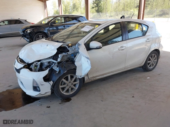 2012 Toyota Prius c One with VIN JTDKDTB35C1015176, listed as a IAAI auction lot 42053659 with 94,565 mi miles. Bid and sale history available at carsss.com. Image 17.