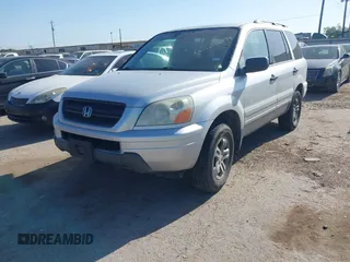 2005 Honda Pilot EX-L with VIN 5FNYF18585B061869, listed as a IAAI auction lot 41982694 with 183,873 mi miles. Bid and sale history available at carsss.com. Image 2.