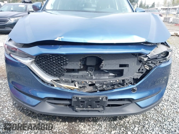 2017 Mazda CX-5 Grand Touring with VIN JM3KFADL5H0100146, listed as a IAAI auction lot 41997181 with 80,071 mi miles. Bid and sale history available at carsss.com. Image 6.