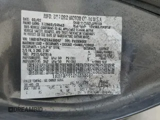 2002 Mercury Sable LS Premium z VIN 1MEFM59S22A630047, wystawiony jako Copart lot #51497465 z przebiegiem 118 019 mil mil oraz Szkoda całkowita • Salvage title. Historia ofert i sprzedaży dostępna na DreamBid. Obrazek 13.
