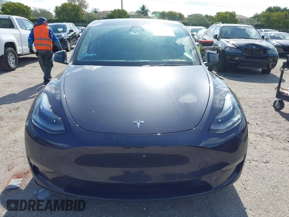2024 Tesla Model Y Long Range z VIN 7SAYGDEE0RA263842, wystawiony jako IAAI lot #42106339 z przebiegiem 48 447 mil mil oraz . Historia ofert i sprzedaży dostępna na DreamBid. Obrazek 12.