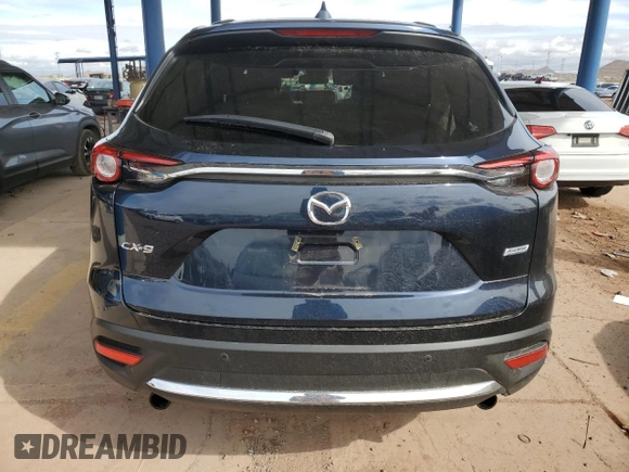 2018 Mazda CX-9 Grand Touring z VIN JM3TCADY2J0220873, wystawiony jako Copart lot #49264875 z przebiegiem Nie podano mil oraz Szkoda całkowita • Salvage title. Historia ofert i sprzedaży dostępna na DreamBid. Obrazek 6.