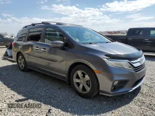 2018 Honda Odyssey EX-L z VIN 5FNRL6H70JB000036, wystawiony jako Copart lot #50455365 z przebiegiem 141 010 mil mil oraz Szkoda całkowita • Salvage title. Historia ofert i sprzedaży dostępna na DreamBid. Obrazek 4.