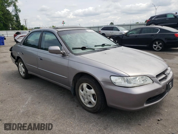 2000 Honda Accord EX z VIN 1HGCG5656YA060963, wystawiony jako Copart lot #54715235 z przebiegiem 266 918 mil mil oraz Szkoda całkowita • Salvage title. Historia ofert i sprzedaży dostępna na DreamBid. Obrazek 4.