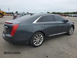 2016 Cadillac XTS Luxury Collection with VIN 2G61N5S34G9120168, listed as a Copart auction lot 61776225 with 83,721 mi miles and Salvage title. Bid and sale history available at DreamBid. Image 3.