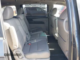 2012 Honda Odyssey EX-L with VIN 5FNRL5H6XCB061026, listed as a IAAI auction lot 42574612 with 144,480 mi miles and . Bid and sale history available at DreamBid. Image 8.