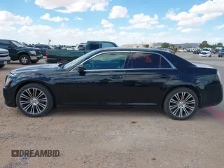 2014 Chrysler 300 S with VIN 2C3CCABG5EH205020, listed as a IAAI auction lot 42247180 with 186,458 mi miles and . Bid and sale history available at DreamBid. Image 13.