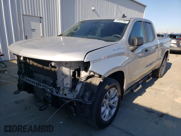 2021 Chevrolet Silverado 1500 Custom with VIN 1GCRWBEK0MZ188967, listed as a Copart auction lot 87637995 with 104,744 mi miles and Salvage Title. Bid and sale history available at DreamBid. Image 1.